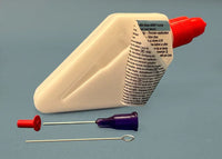 Plastic applicator with red and purple nozzles on a gray background
