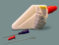 Spray bottle with text label, red nozzle, and two small tools on a gray background
