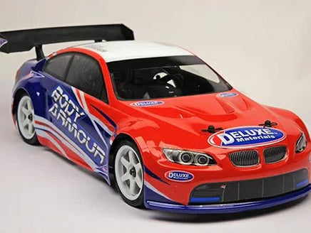 Model race car with visible branding on a gray background