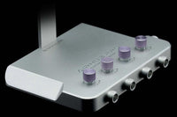 Golf putter head with adjustable components on a black background