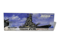 Model of the Imperial Japanese Navy Battleship Musashi on a box with text and branding.