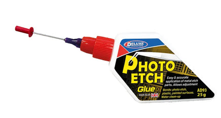 Deluxe Photo Etch Glue bottle with red nozzle on a white background