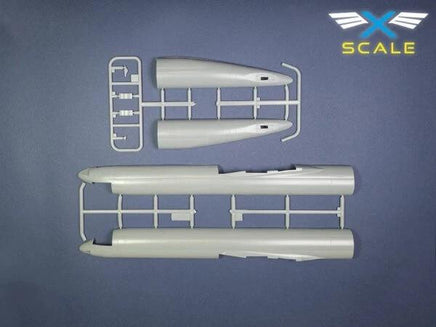 Model airplane parts on a blue background with X-Scale logo.