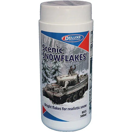 Container of scenic snowflakes with a model tank on the label
