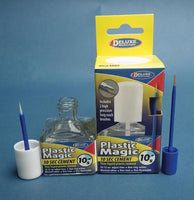 Plastic Magic 10-second cement with packaging and tools on a blue background