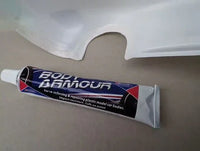 Boat Armor tube with a white car body panel in the background