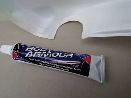 Boat Armor tube with a white car body panel in the background