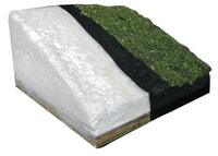 Product packaging with bubble wrap, black material, and green grass-like texture on a white background